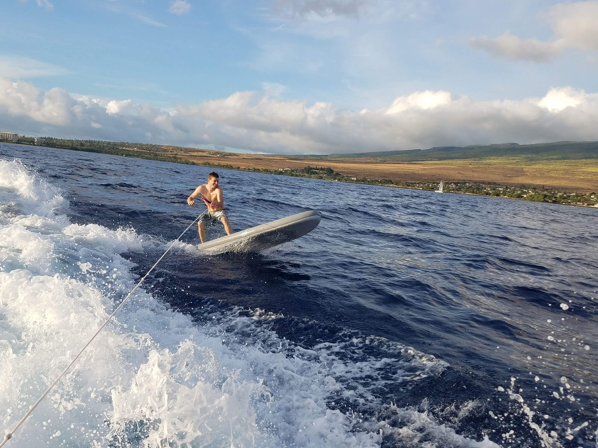 Niels Surfing Behind the Boat